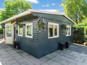 Lovely Wooden Chalet with garden in Reutum